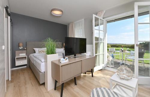 Breege Resort | Discover Hotel- & Ferienanlage Kapitäns-Häuser Breege