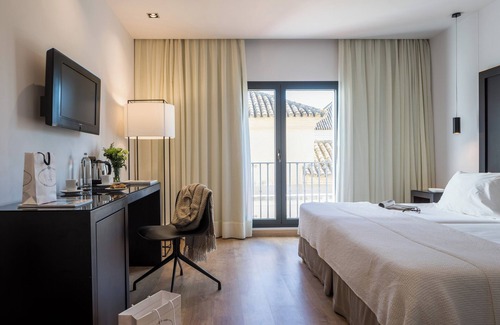 San Bartolome Hotel | Discover Hotel Fernando III: 4-Star Retreat with Spa & Pool