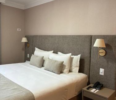 Americana Hotel | Experience Hotel Florença: 4-Star Comfort with Pool & Hot Tub