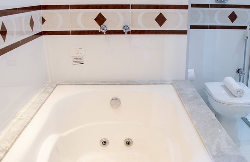 Americana Hotel | Experience Hotel Florença: 4-Star Stay with Pool & Spa