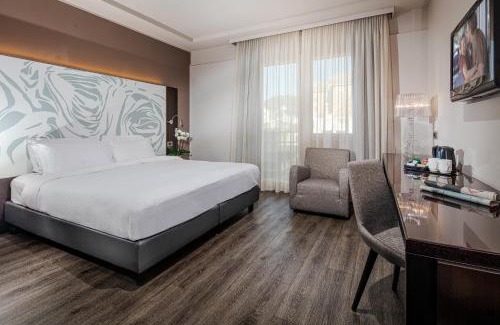 Gradisca d'Isonzo Hotel | Elegant Hotel Franz: 4-Star Stay with Pool & Breakfast