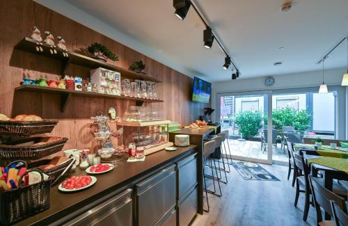 Waggershausen Hotel | Discover Hotel Gästehaus Stock: Scenic Waterfall Retreat