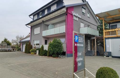 Waggershausen Hotel | Discover Hotel Gästehaus Stock: Scenic Waterfall Retreat