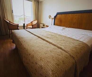 Rosario Hotel | Serene Hotel Garden: 4-Star Retreat with Ocean Views