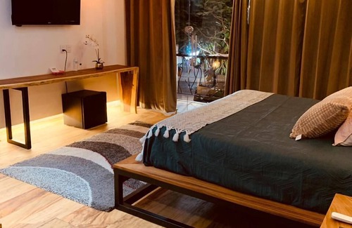 Tonala Hotel | Explore Hotel Garden Suites Tonlá with Pool and Spa