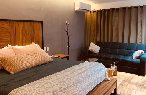 Tonala Hotel | Explore Hotel Garden Suites Tonlá with Pool and Spa