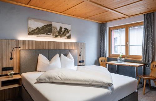 Brand Apartment | Discover Hotel Garni Madrisa: Pet-Friendly Retreat with Hot Tub