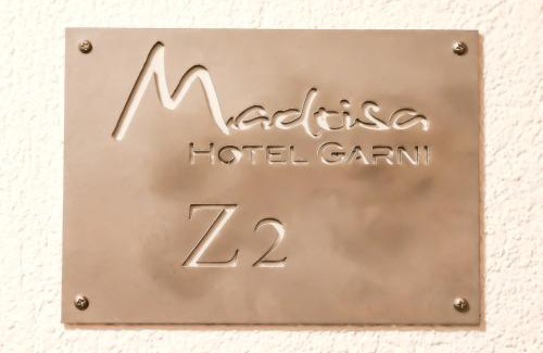 Brand Apartment | Discover Hotel Garni Madrisa: Pet-Friendly Retreat with Hot Tub