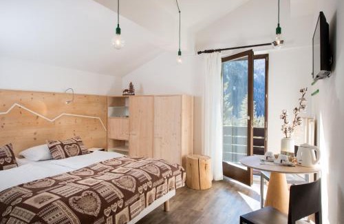 Malga Ciapela Hotel | Oceanfront Comfort at Hotel Garni Roberta, Rated 9.2/10