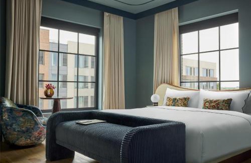 East Market District Hotel | Elegant Hotel Genevieve: Pet-Friendly & Eco-Conscious Stay