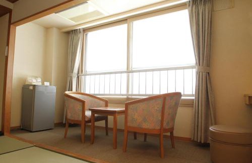 Akankohan Hotel | Elegant Hotel Gozensui: Family-Friendly with Hot Tub Access