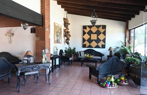 Oaxaca Hotel | Poolside Relaxation at Hotel Hacienda - Rated 8.8/10