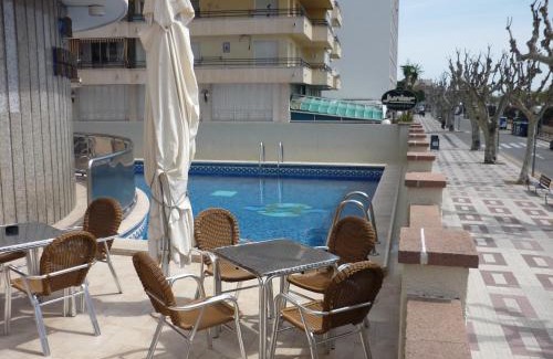 Calella Hotel | Explore Hotel Haromar: Poolside Retreat with Ocean Views