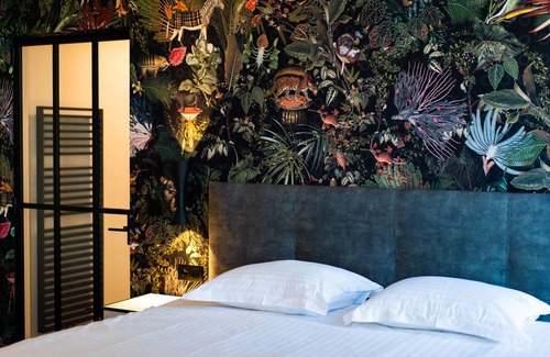 De Panne Hotel | Elegant Hotel Iris: 4-Star Stay with Pool & Spa Access