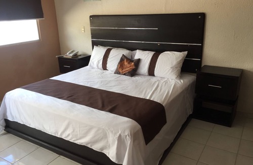 Huixtla Hotel | Discover Hotel Jardin Real: Family-Friendly with Spa & Pool