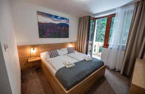 Jasna Hotel | Hotel Jasná: Relax with Spa, Hot Tub & Family-Friendly Fun