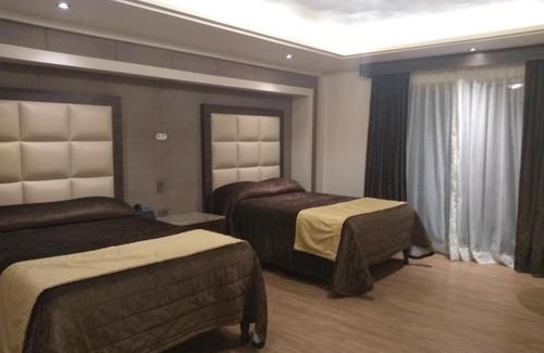 Jimenez Hotel | Discover Hotel Jiménez Plaza: Family-Friendly & Poolside Retreat