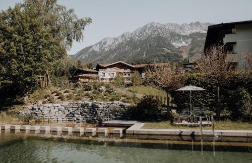 Scheffau am Wilden Kaiser Hotel | Discover Hotel Kaiser in Tirol: 4-Star Escape with Spa & Pool