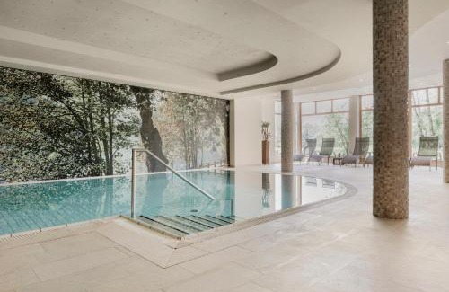 Scheffau am Wilden Kaiser Hotel | Discover Hotel Kaiser in Tirol: 4-Star Escape with Spa & Pool