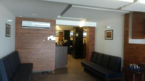 Khambhaliya Hotel | Guest Rated: Hotel Kalyan's - Mansingh Inn with Fireplace