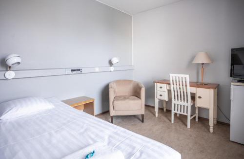 Sodankyla Hotel | Budget-Friendly Stay at Karhu with Hot Tub & Pet Access