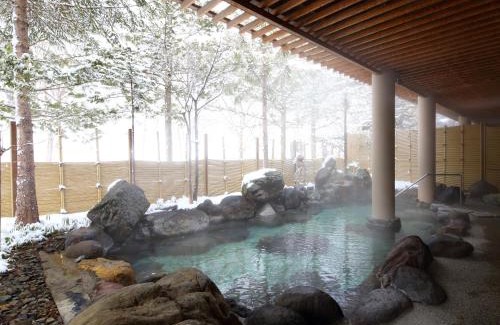 Oyu Onsen Hotel | Relax at Hotel Kazuno: Enjoy Hot Tub & Breakfast Delights