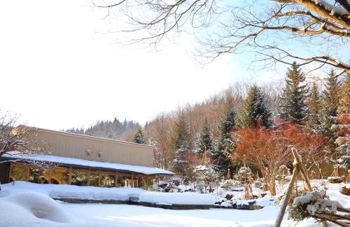 Oyu Onsen Hotel | Relax at Hotel Kazuno: Enjoy Hot Tub & Breakfast Delights