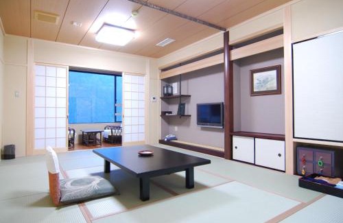 Miyoshi Hotel | Discover Hotel Kazurabashi: Rated 9.3/10 with Hot Tub