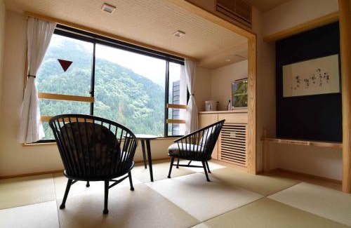 Miyoshi Hotel | Discover Hotel Kazurabashi: Rated 9.3/10 with Hot Tub