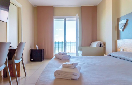 Torre Lapillo Hotel | Relax at Hotel la Spiaggia: Ocean Views & Family-Friendly