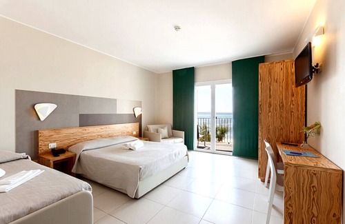 Torre Lapillo Hotel | Relax at Hotel la Spiaggia: Ocean Views & Family-Friendly