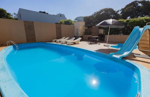 Foz do Iguacu City Centre Hotel | Discover Hotel Lawrence: Oceanfront Retreat with Pool & Spa