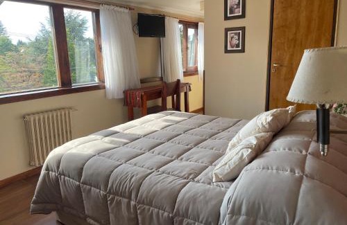 San Carlos de Bariloche Hotel | Hotel Le Charme: Guest Rated 9.9 with Pool & Parking