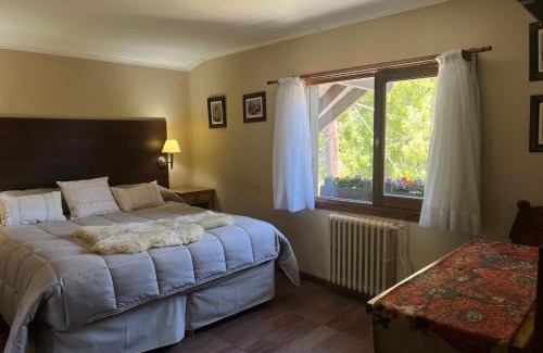 San Carlos de Bariloche Hotel | Hotel Le Charme: Guest Rated 9.9 with Pool & Parking