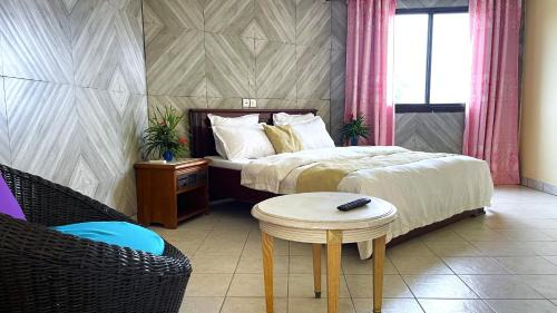 Kribi Hotel | Inviting Hotel les Polygones Kribi with Pool & Ocean Views