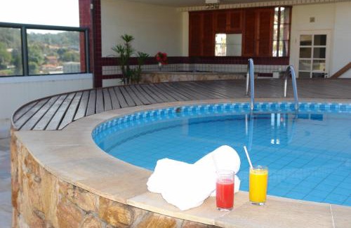 Caxambu Hotel | Discover Hotel Lopes Caxambu: Family-Friendly Retreat