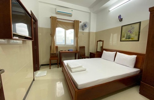 Di An Hotel | Discover Hotel Mỹ Việt: Pet-Friendly with Breakfast Included