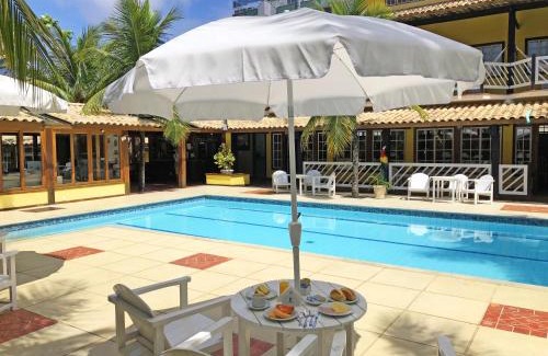 Braga Hotel | Discover Hotel Mar de Cabo Frio with Pool & Family-Friendly Perks