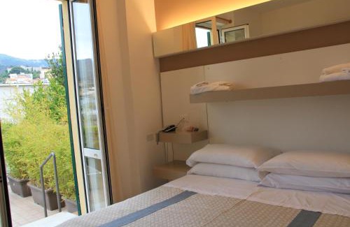 Spotorno Hotel | Hotel Melograno: Family-Friendly Retreat with Ocean Views