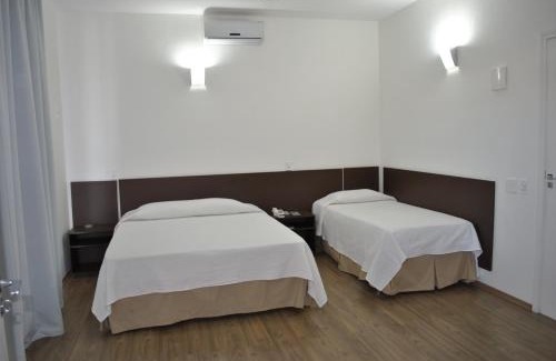 Sao Lourenco Hotel | Discover Hotel Metrópole: 4-Star Comfort with Pool Access