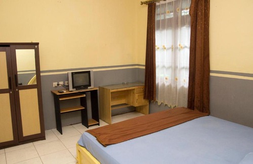 Banjarmasin Hotel | Discover Hotel Metro Banjarmasin: Rated 8/10 by Guests