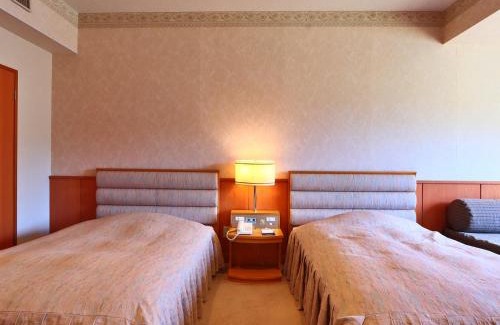 Gero Hotel | Relax at Hotel Miki: Family-Friendly with Hot Tub Access