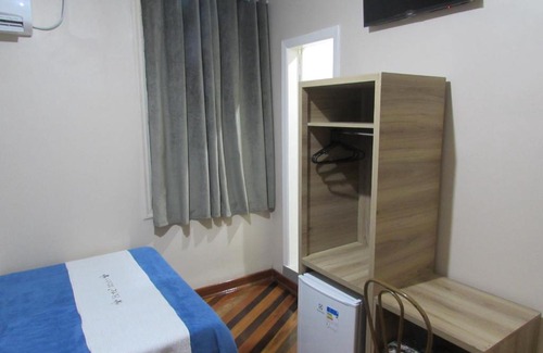 Santa Ifigenia Hotel | Hotel Minho: Prime Location Near Electronics Market