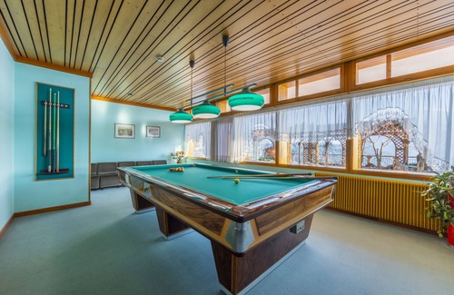 San Lorenzo in Banale Hotel | Discover Hotel Miravalle: Poolside Haven for Families