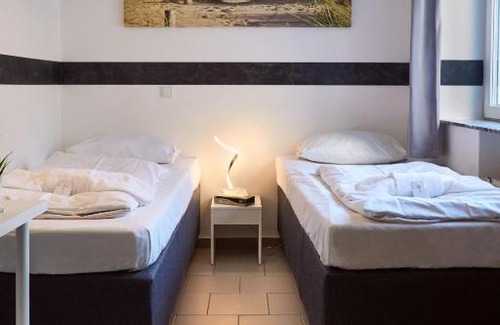 Kalk Hotel | Budget-Friendly Hotel Moji Köln with Family and Pet Amenities