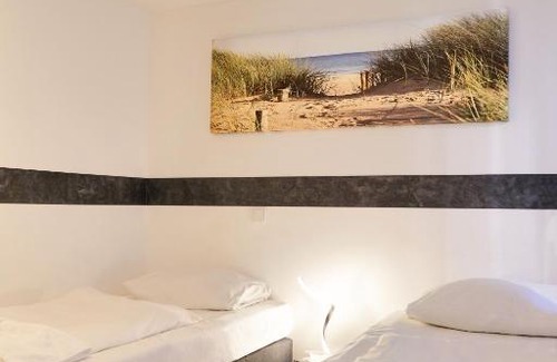 Kalk Hotel | Budget-Friendly Hotel Moji Köln with Family and Pet Amenities