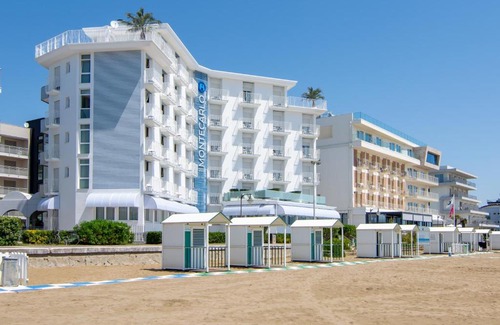 Caorle Hotel | Hotel Montecarlo: Oceanfront Stay with Private Beach Access
