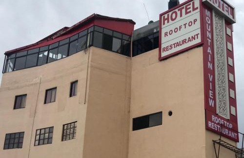 Pithoragarh Hotel | Scenic Hotel Mountain View with Rooftop Restaurant Awaits