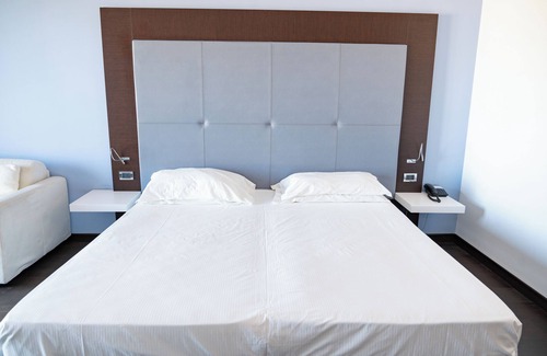 Torre Melissa Hotel | Relax at Hotel Napoleon with Ocean Views and Spa Access