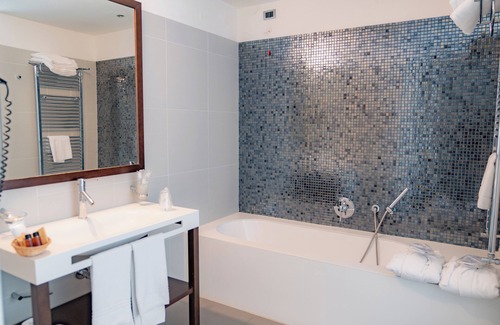 Torre Melissa Hotel | Relax at Hotel Napoleon with Ocean Views and Spa Access